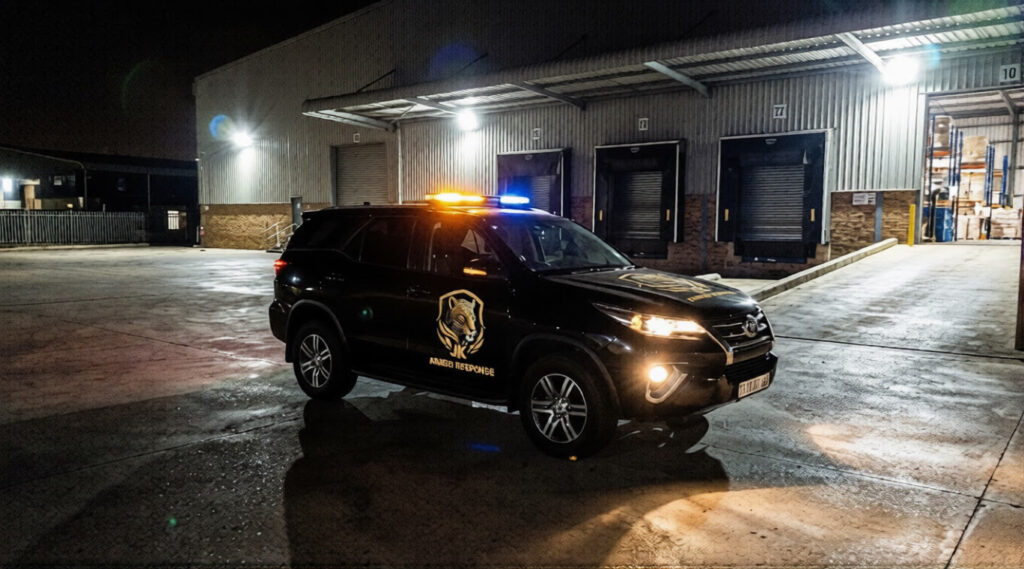 JK Armed Response vehicle patrolling a warehouse facility in Johannesburg South to prevent theft.